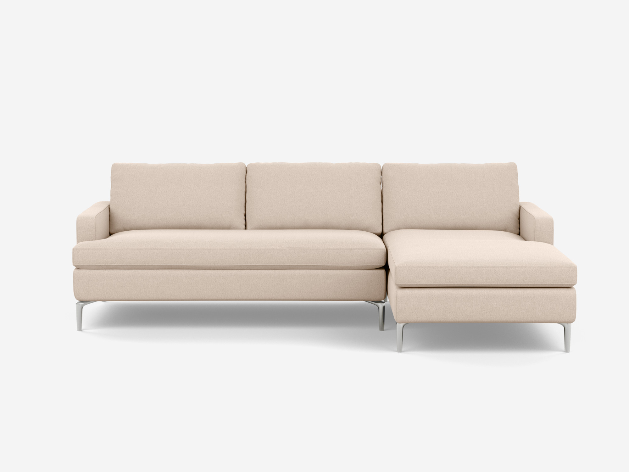 front view of the Eve Grand modular sofa in white fabric with right hand chaise